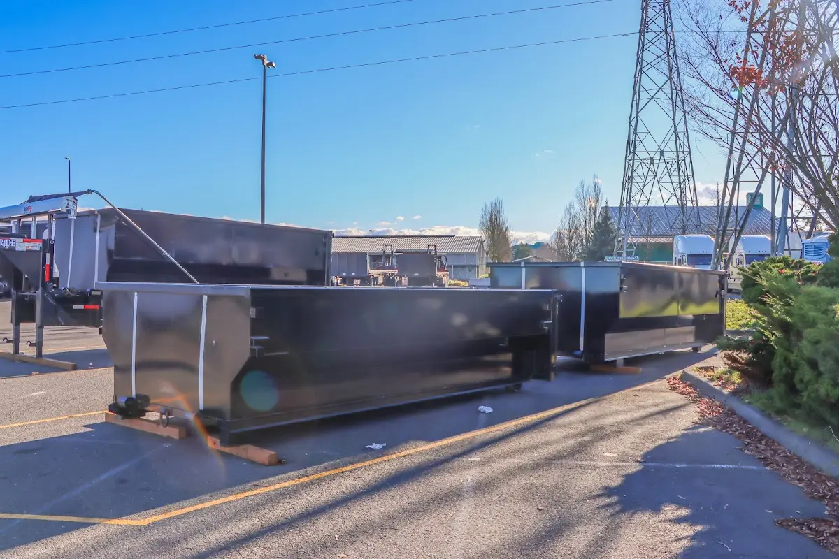 Roll-off dumpster ready for waste disposal at job site for Roofing Dumpster Rental in Wilton